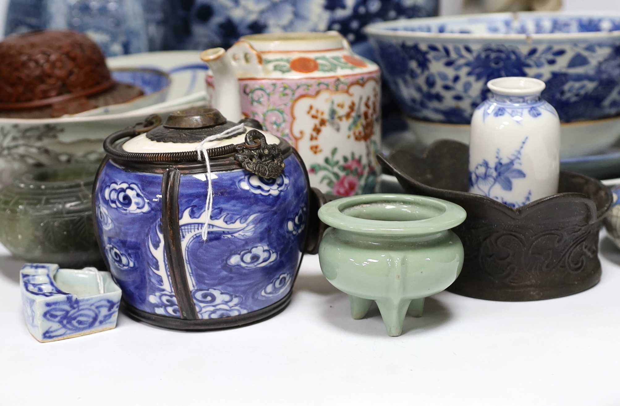 A Chinese blue and white jar and a soapstone figure, 31cm high